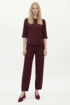 blusa bouclê zíper costas
