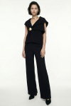 blusa bouclê broche lateral